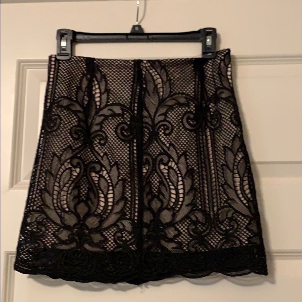 Black lace mini skirt